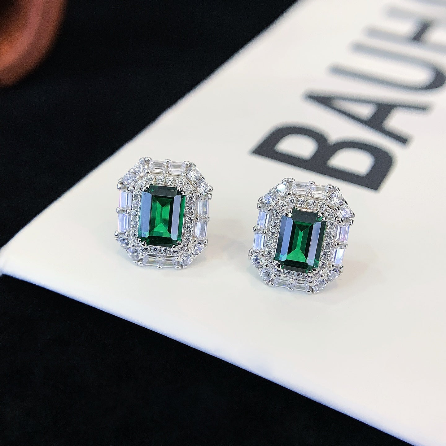 S925 silver ear studs set with green cultivated gemstones