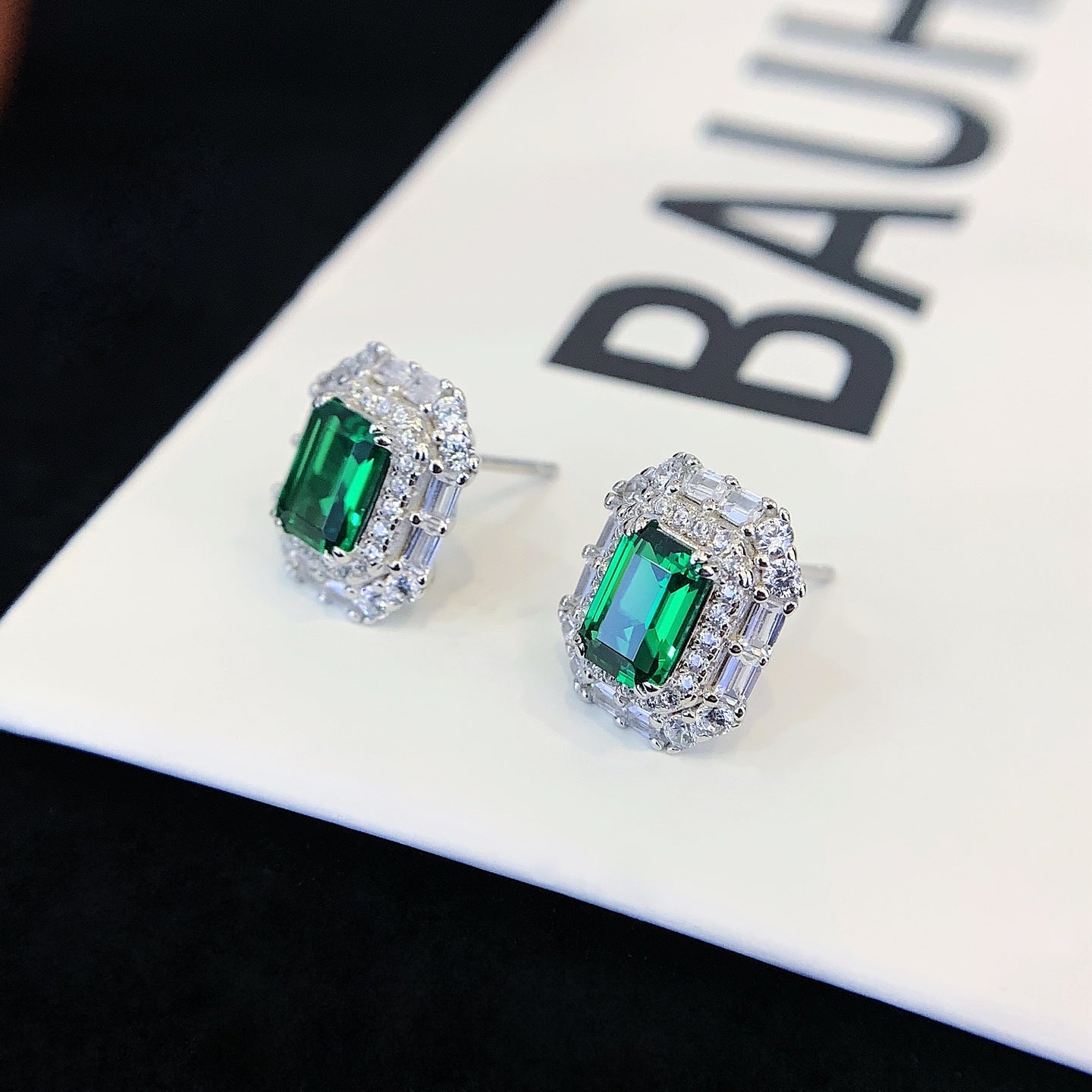 S925 silver ear studs set with green cultivated gemstones