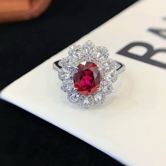 Sterling Silver Ring With Red Gems